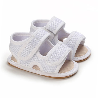White first walker mesh sandals, breathable summer shoes for baby boys with secure velcro straps.