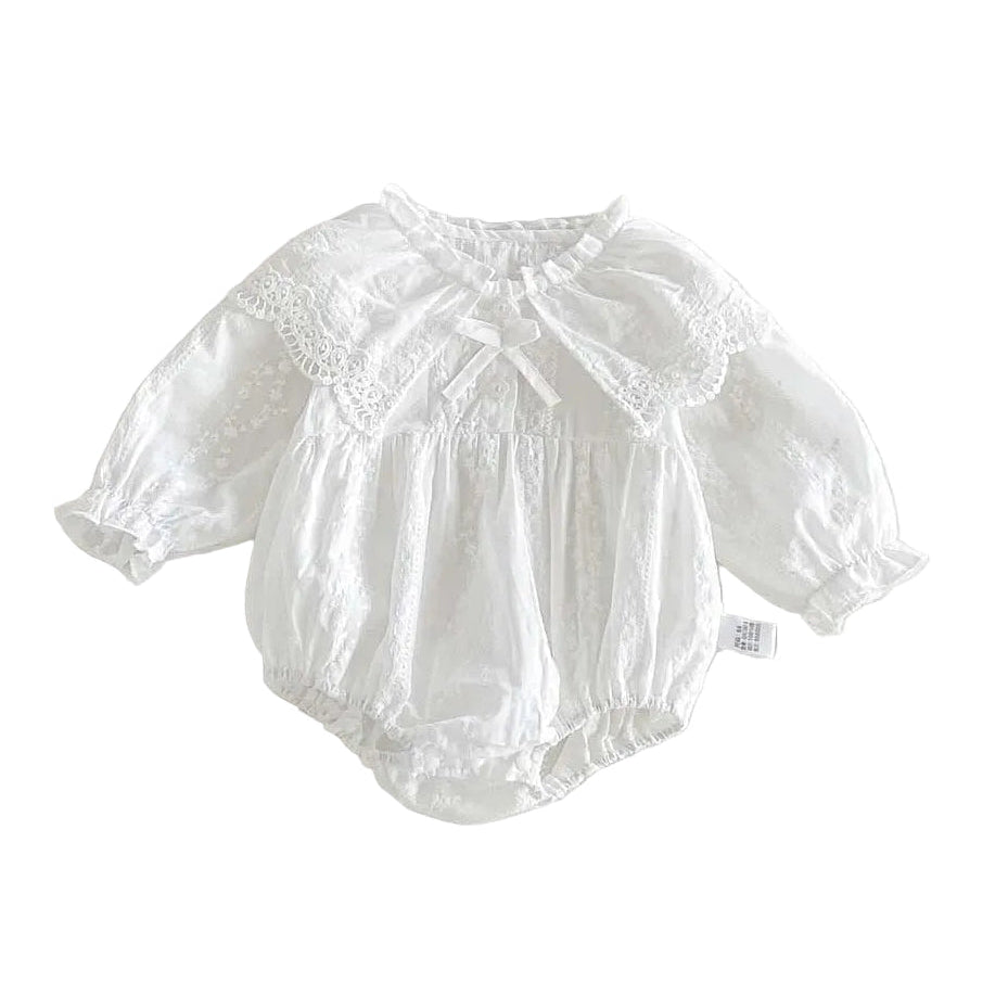 Pure white baby girl long-sleeve bubble romper featuring an oversized lace Peter Pan collar, bishop sleeves, and front bow.