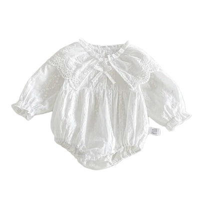 Pure white baby girl long-sleeve bubble romper featuring an oversized lace Peter Pan collar, bishop sleeves, and front bow.