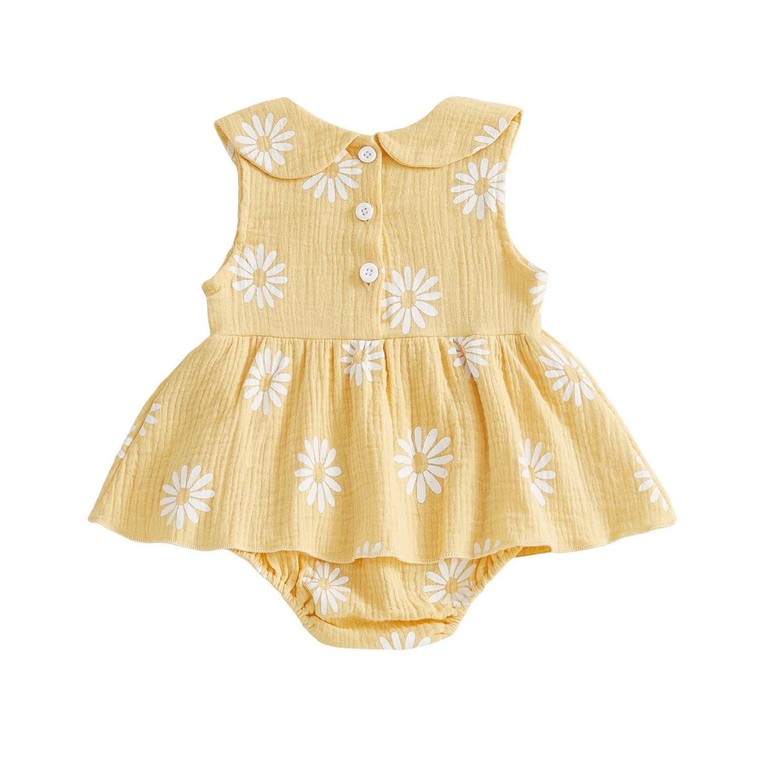 Back view of the yellow sleeveless baby girl daisy print romper dress showing the clean lines and ruffled skirt overlay.