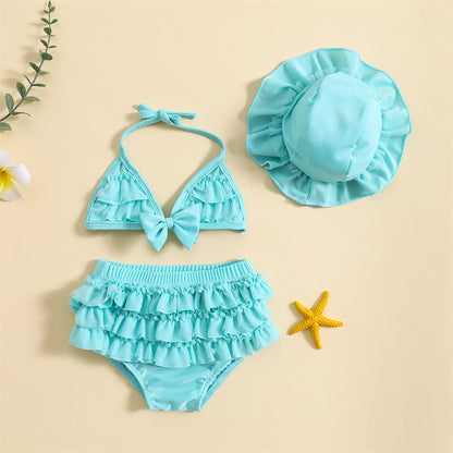 Sky blue baby girl summer swimwear featuring a halter neck vest top and matching ruffle diaper cover shorts.