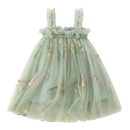 Flat lay of Mystic Sage Green baby and toddler fairy girls' dress featuring colorful floral embroidery, 'Forget-Me-Not' script, and layered fluffy tulle. Sleeveless Easter princess tutu with ruffled mesh straps and 100% cotton lining.