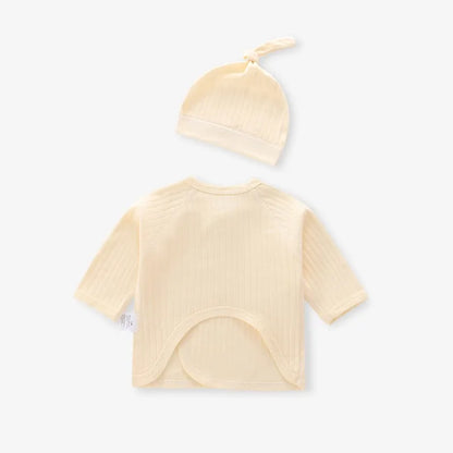Back of yellow side-snap baby top and hat, detailing the soft knit fabric quality and rear construction.