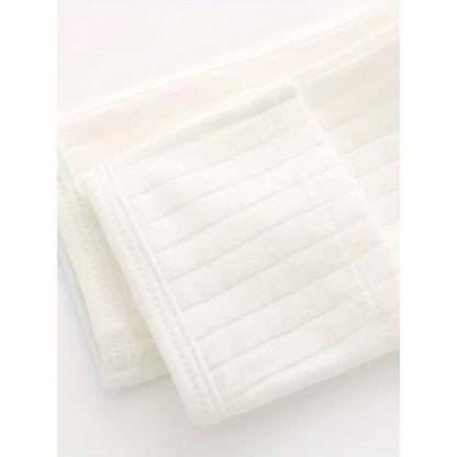 Close up of ribbed cotton fabric texture and soft folded cuff stitching on newborn long sleeve kimono top.