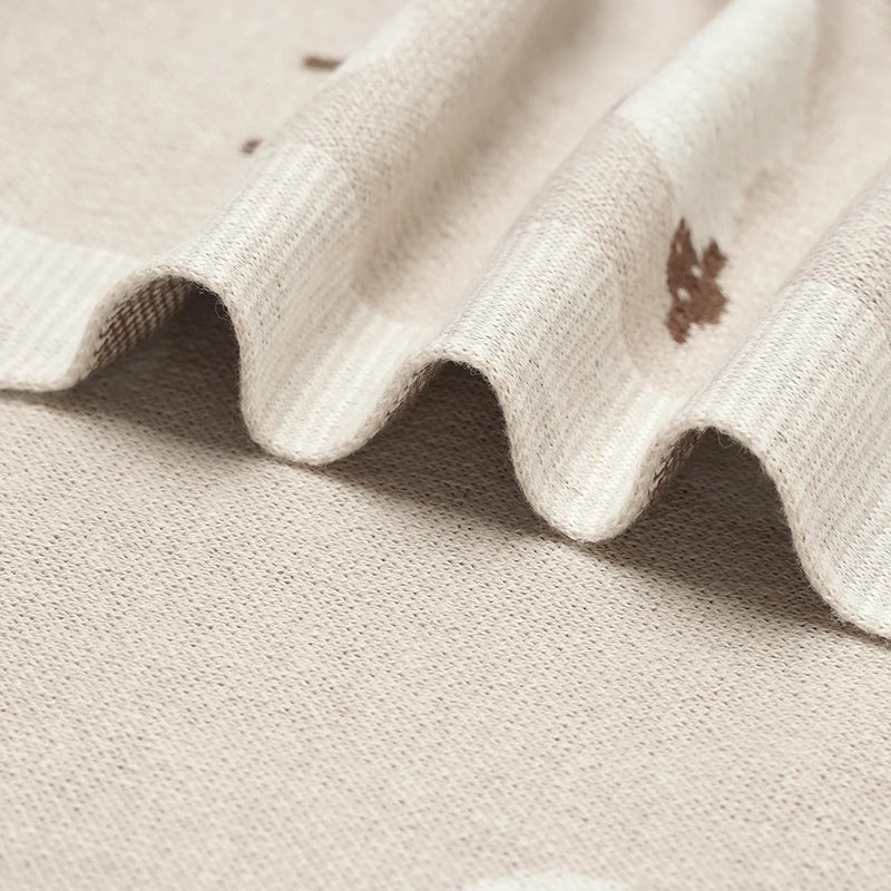 Macro shot of the breathable 100% cotton knit in Oatmeal, highlighting the high-quality stitching and anti-pilling finish.