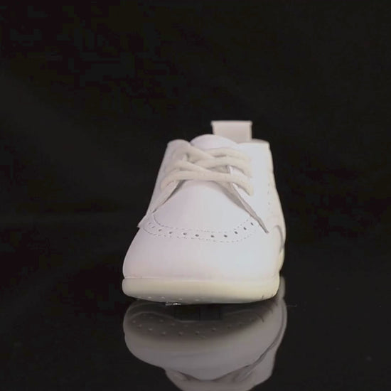 Video demonstration showing the quality, texture, and flexible rubber sole of Kidsely pebbled baby dress shoes.