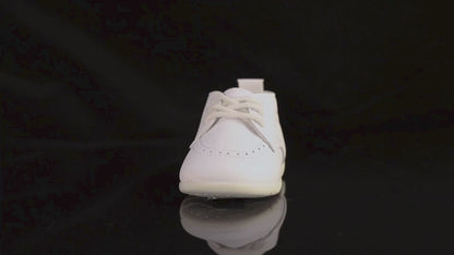 Video demonstration showing the quality, texture, and flexible rubber sole of Kidsely pebbled baby dress shoes.