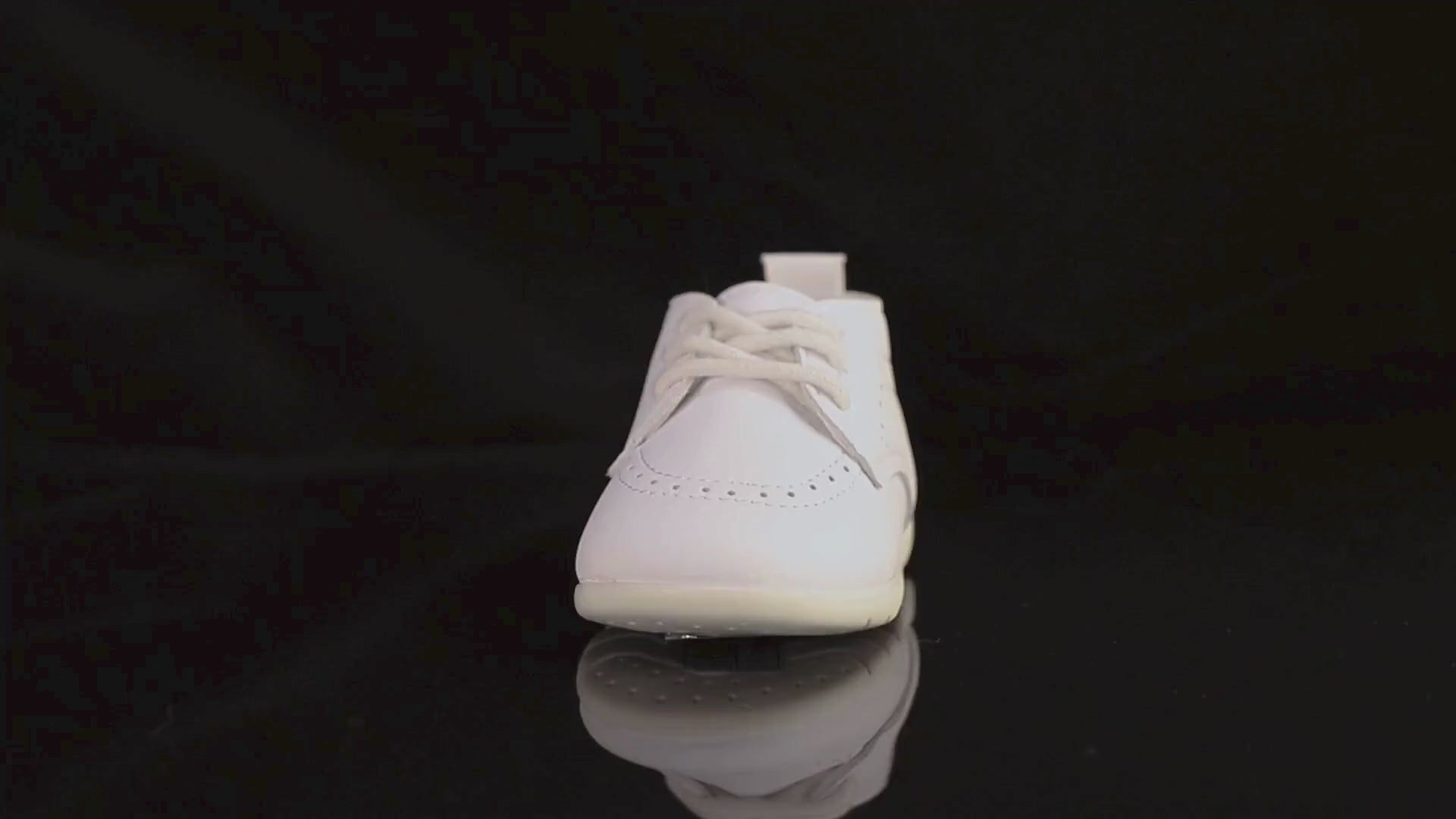 Video demonstration showing the quality, texture, and flexible rubber sole of Kidsely pebbled baby dress shoes.