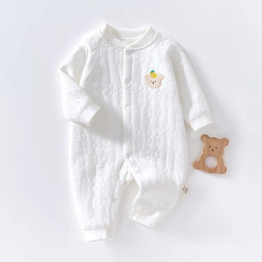 White long sleeve baby jumpsuit with bear patch made from soft jacquard cotton.