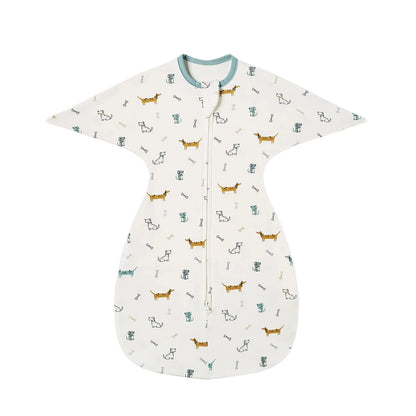 White baby sleeping bag with cute dachshund sausage dog pattern and teal trim.