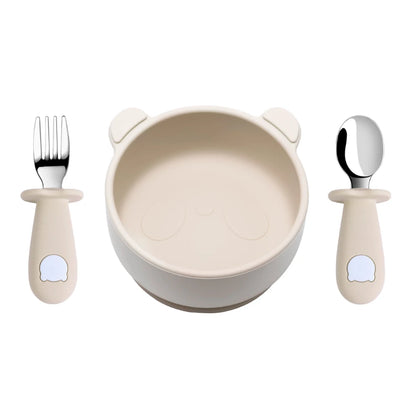 Children's dining set with bowl, fork, and spoon on a white background