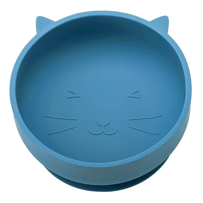 Blue silicone bowl with cat face design on a white background