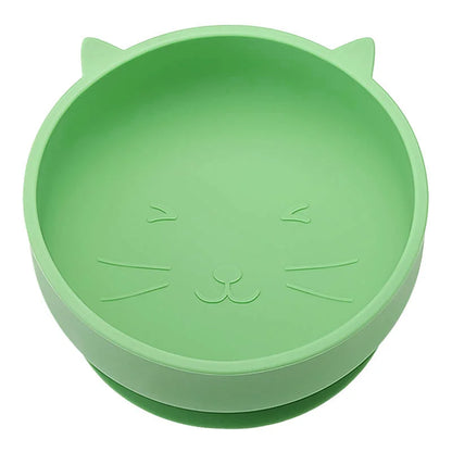 Green silicone bowl with cat face design on a white background