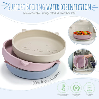 Set of three silicone dishes with cat face design, stacked on a white background.