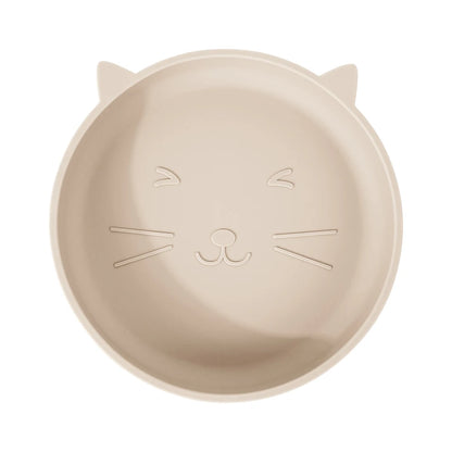 Beige plate shaped like a cat's face on a white background