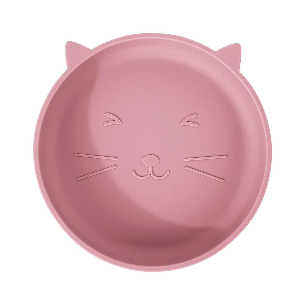 Pink cat-shaped plate on a white background