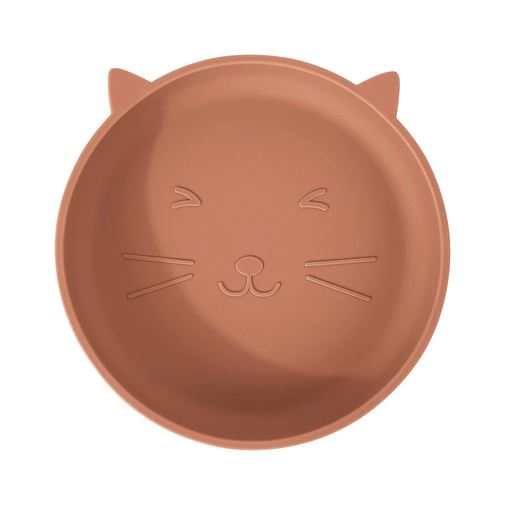 Silicone cat plate with a face design on a white background