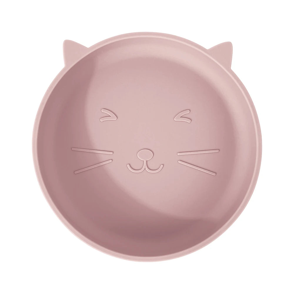 Pink cat-shaped plate on a white background