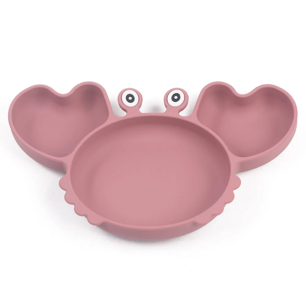 Pink crab-shaped bowl on a white background