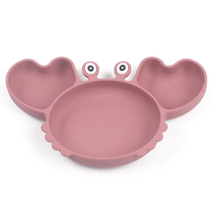 Pink crab-shaped bowl on a white background