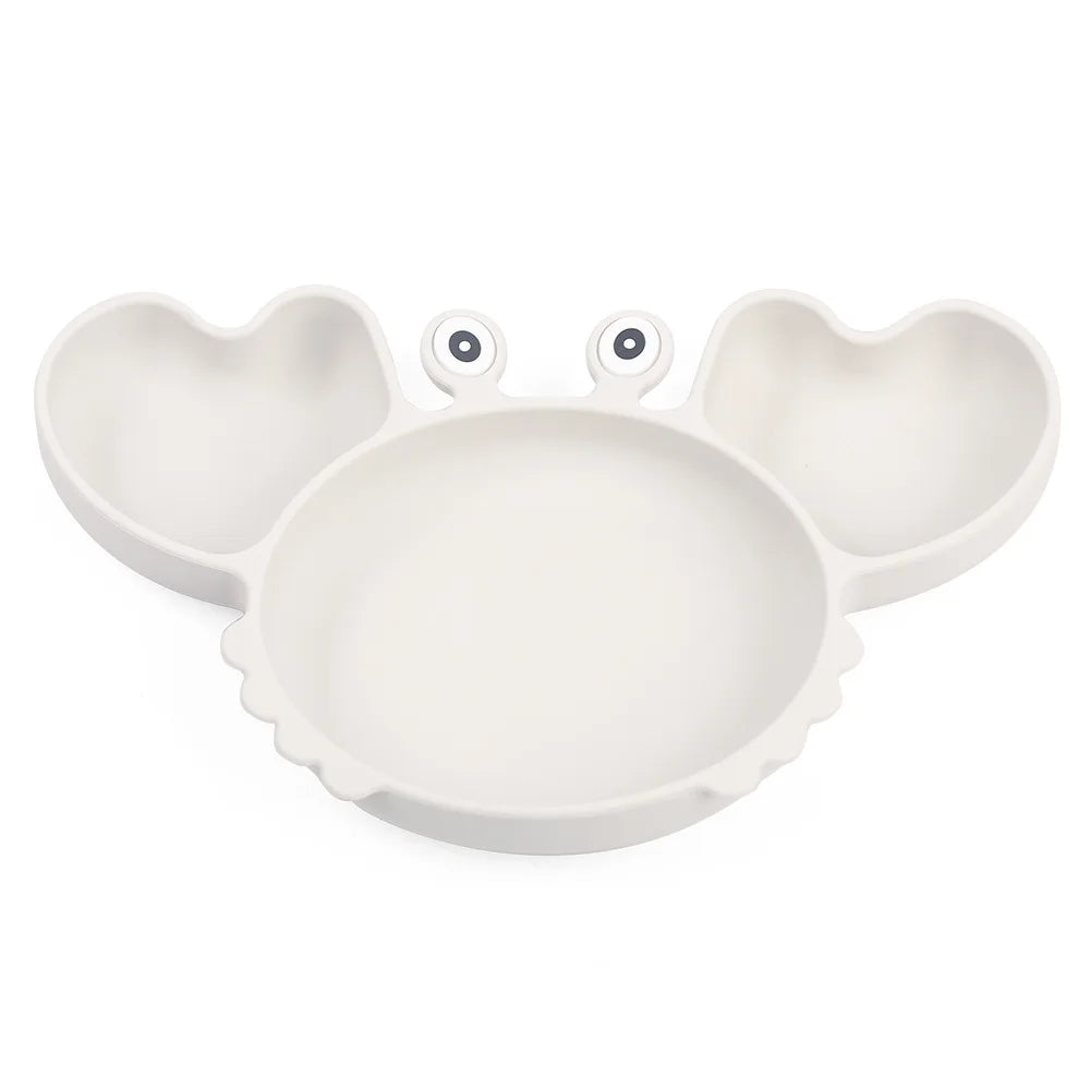 White silicone crab-shaped dish on a white background