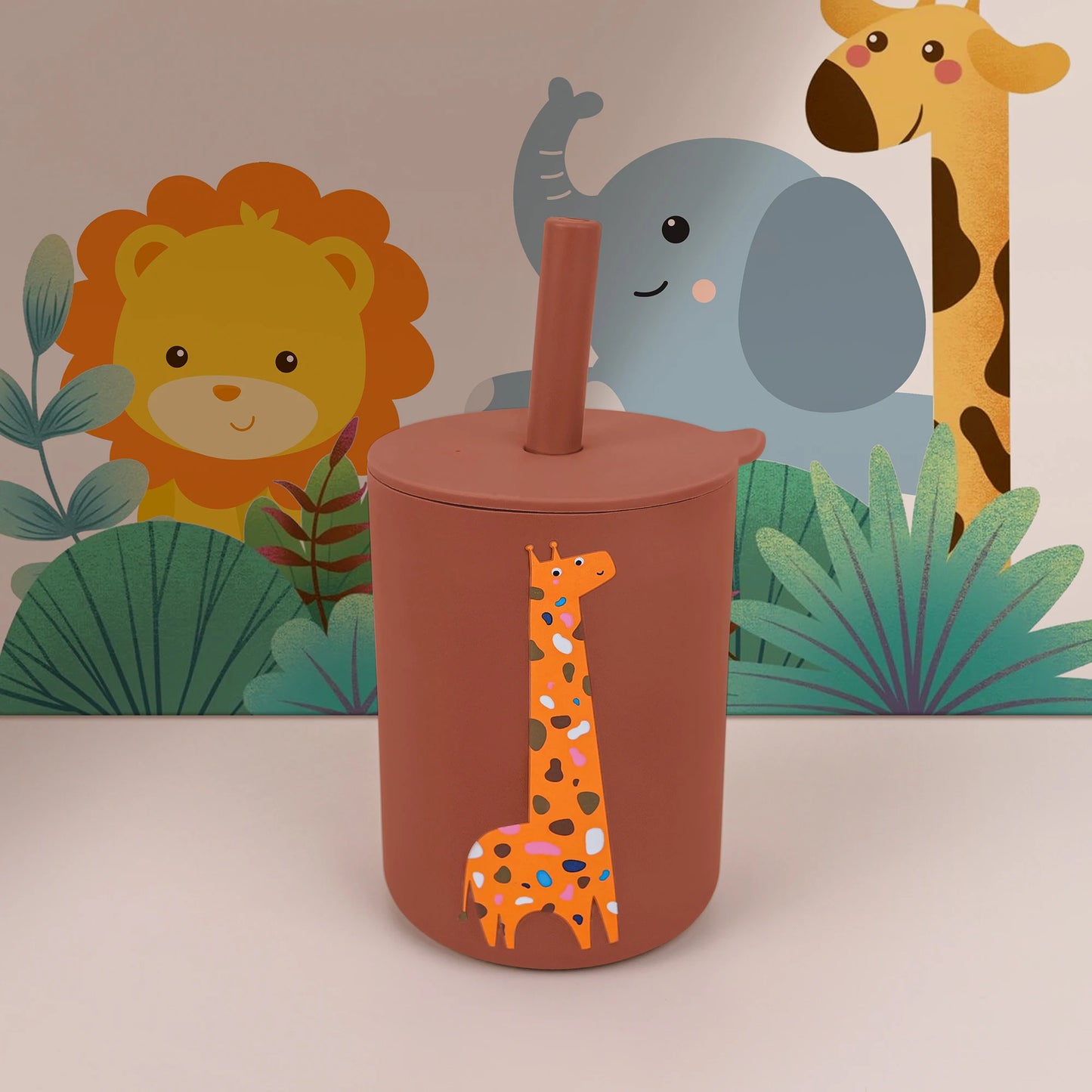 Children's tumbler with a giraffe design against a jungle-themed background