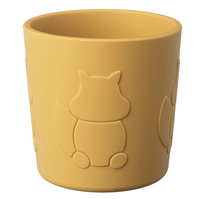 Yellow cup with squirrel embossing on a white background