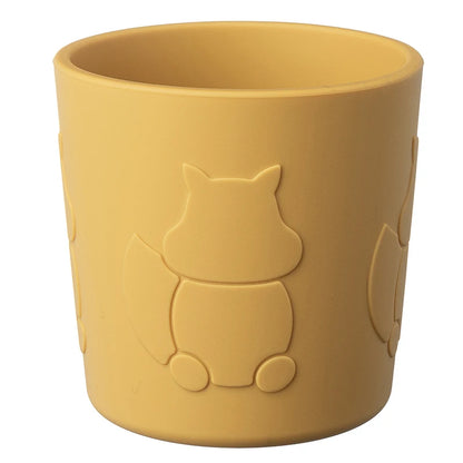 Yellow cup with squirrel embossing on a white background