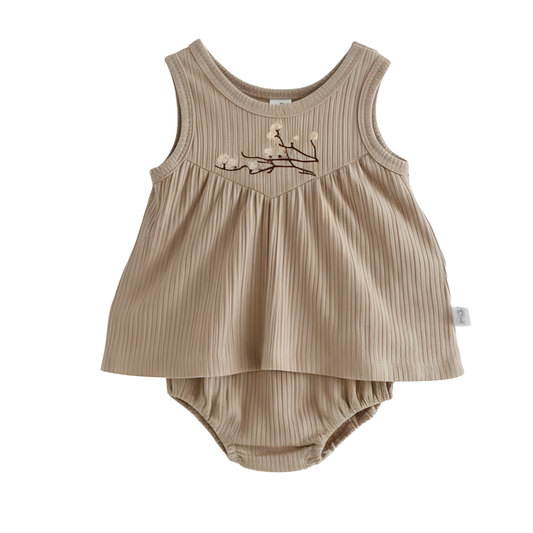 Flat lay of a toddler girl's 2-piece Cottagecore summer set in mushroom beige, featuring a floral embroidered sleeveless ribbed vest and matching bloomers.
