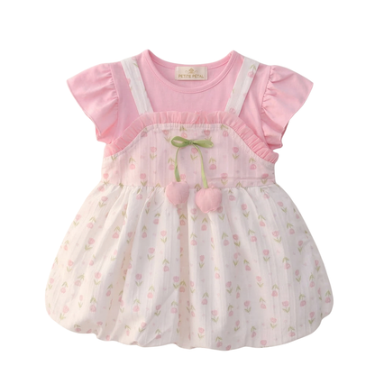 Toddler Girl's dress with pink top and tulip floral skirt on a white background