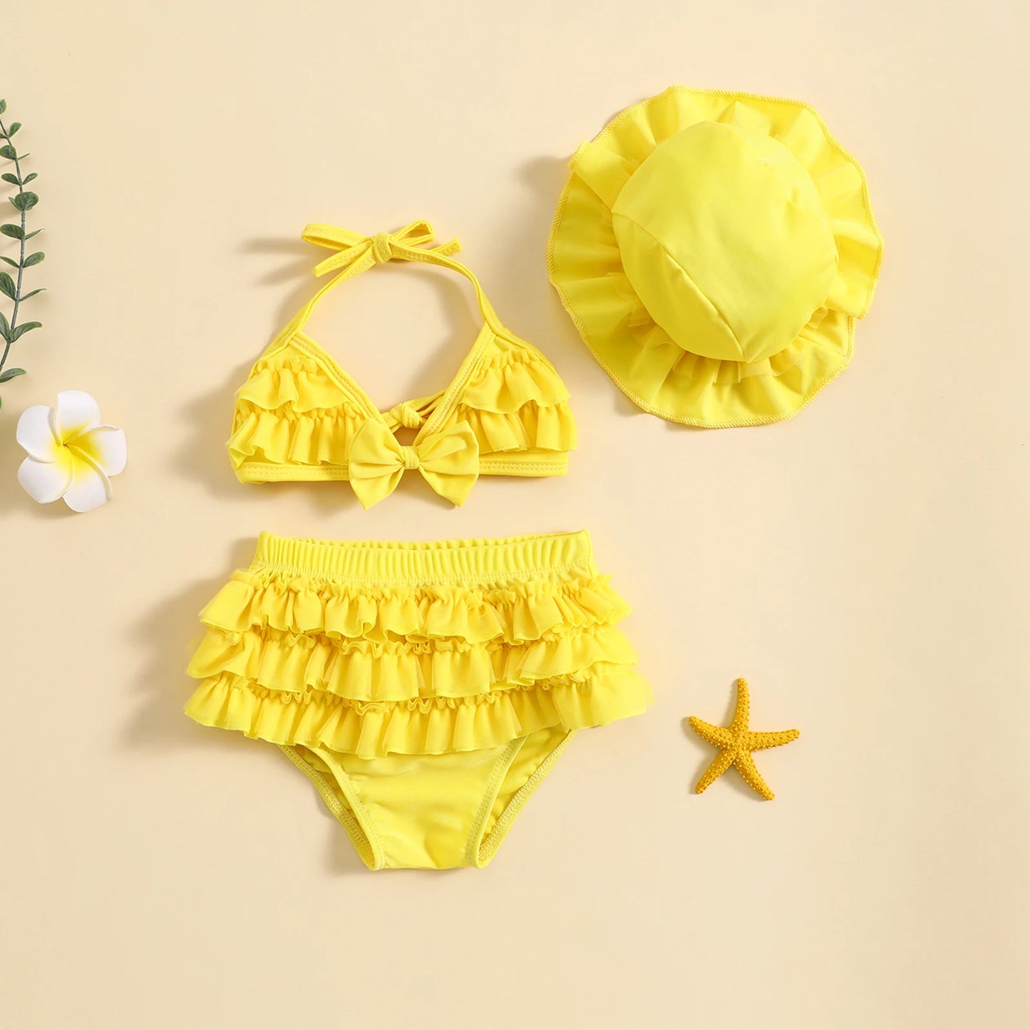 Sunny yellow infant halter neck bikini set with bowknot detail and matching layered ruffle beach hat.