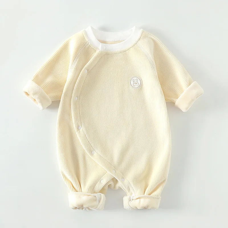 Yellow unisex waffle knit baby sleeper with side snaps for newborn boys and girls.